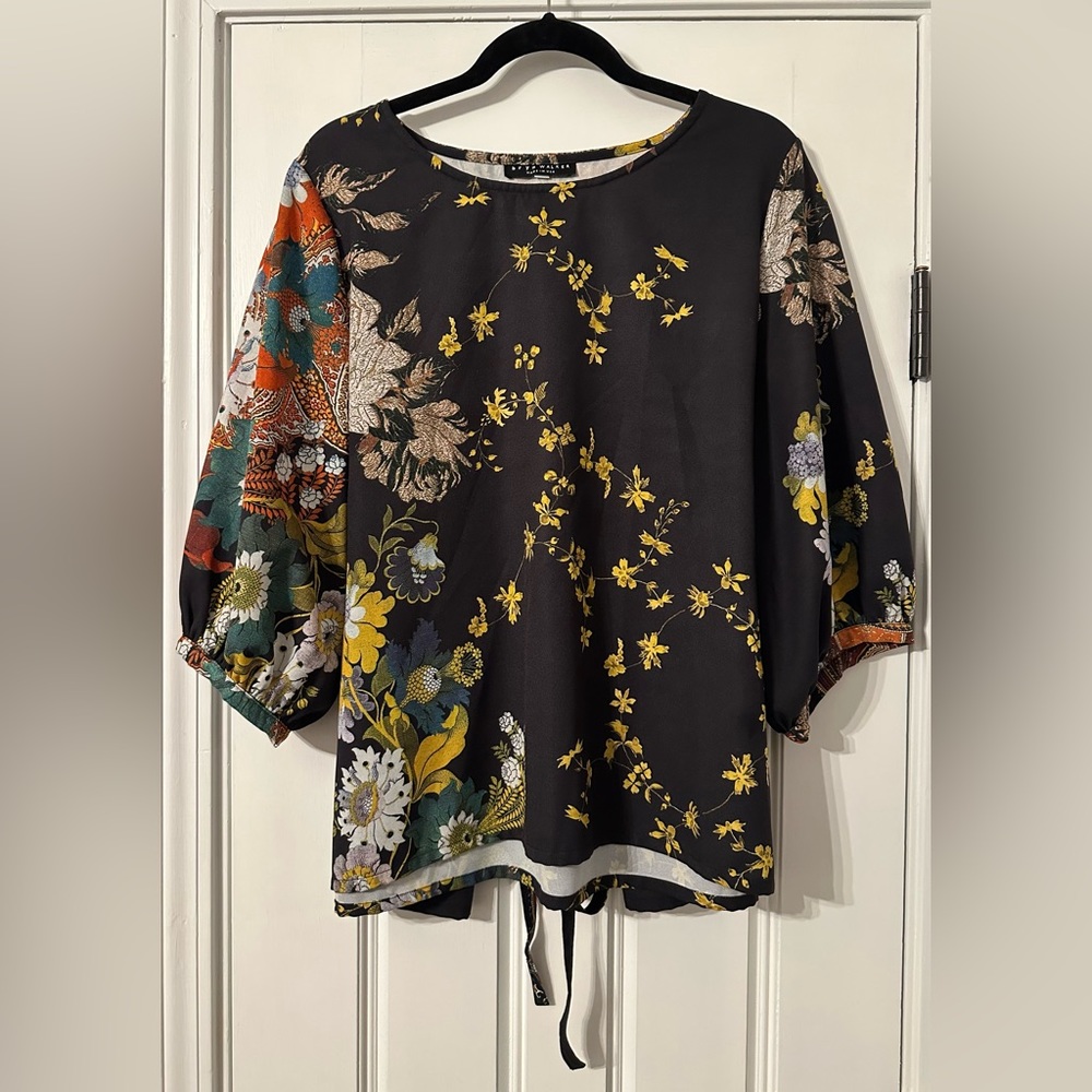 Bryn Walker black balloon sleeve tie back shirt with floral design